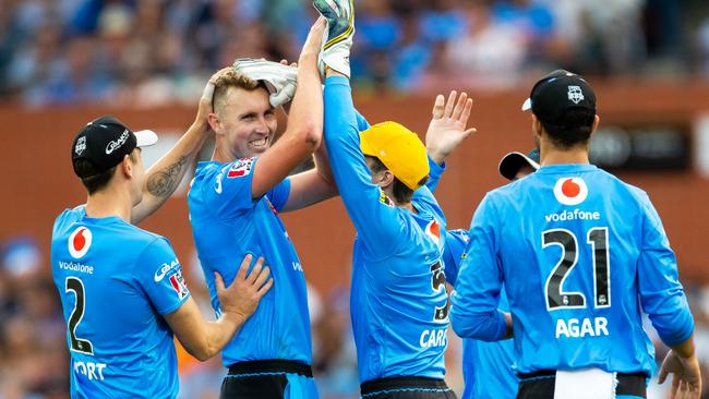 CELEBRATION TIME: Billy Stanlake celebrates with teammates after bowling Sydney Thunder’s Alex Hales on New Year's at Adelaide Oval. Picture: DANIEL KALISZ (Getty Images).