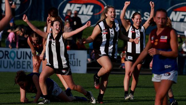 Grace Robinson (left) celebrates a goal. Picture: Hamish Blair