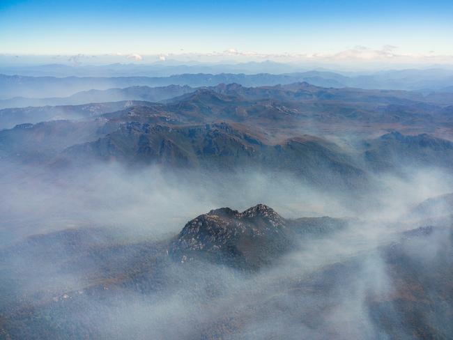2019 Tasmanian bush fires. Centre Star emerging from smoke - at Southwest National Park. . Picture - LUKE TSCHARKE / PAR AVION