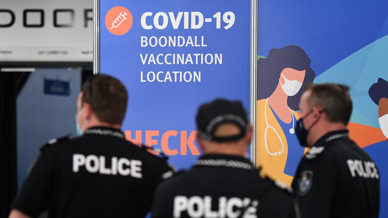 Queensland Police officers arrive to receive the Pfizer Covid-19 vaccine at the newly opened community vaccination hub at the Brisbane Entertainment Centre in Boondall. Picture: NCA NewsWire / Dan Peled