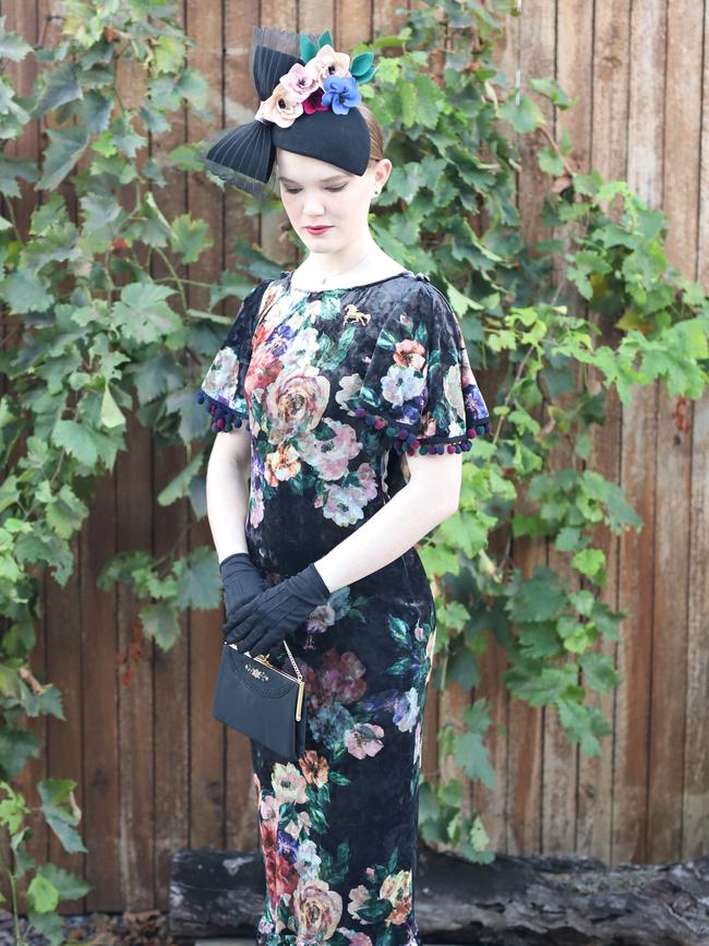 Raceway fashion has moved online with Mackay resident Felicity Huxhagen taking part in the Virtual Fashions Off The Field competition. Ms Huxhagen wore a floral velvet dress made by Anna Dutton Couture and her millinery was from Hats By Helen.