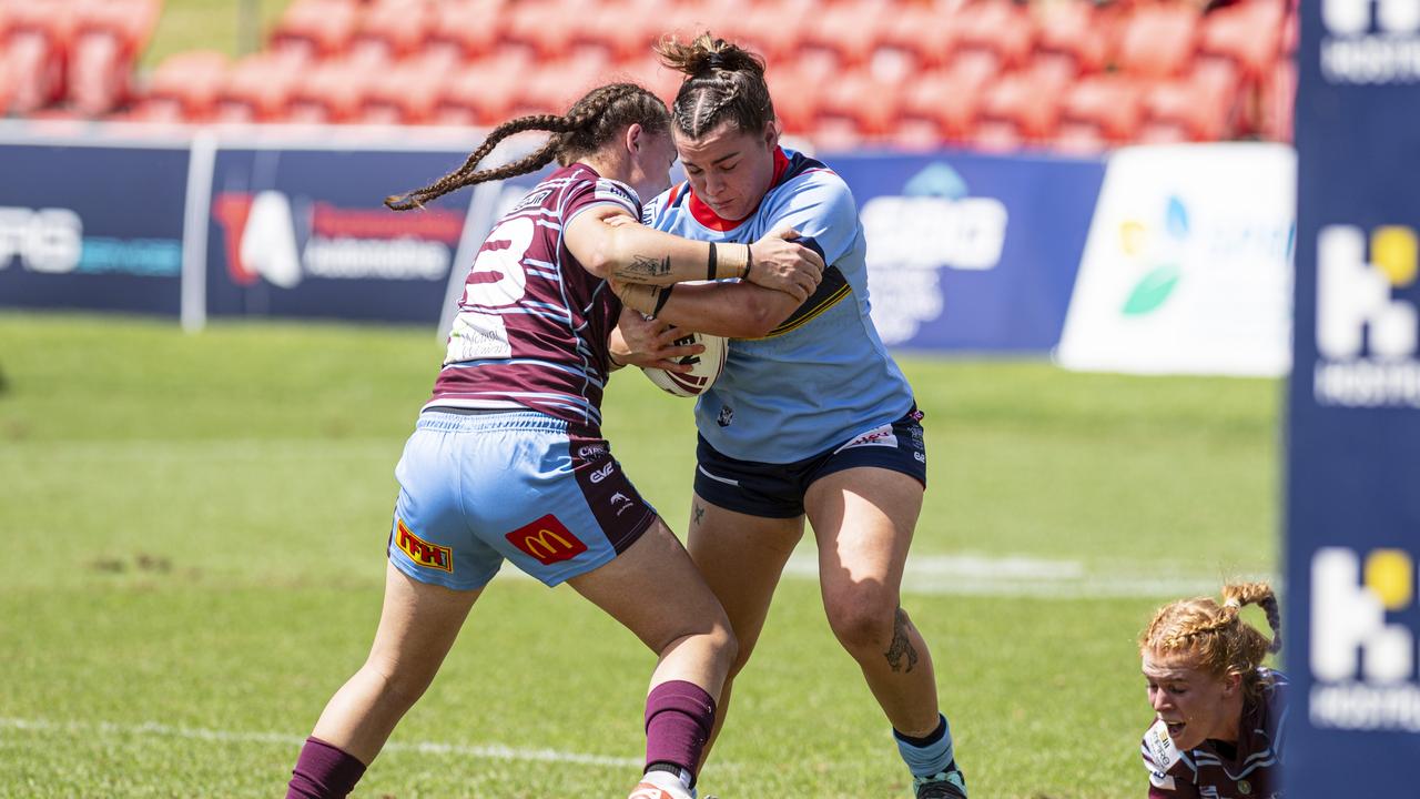 Western Clydesdales Zoe Cook takes on Central Queensland Capras line during a BMD Premiership match between the two sides. Picture: Kevin Farmer