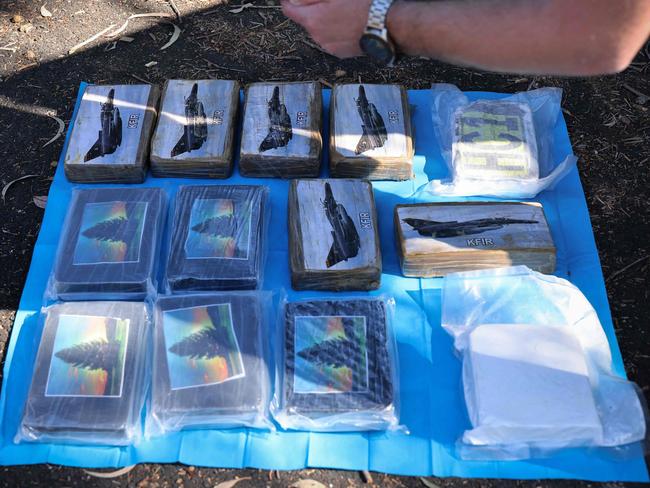 NSW Police seized evidence from an alleged drug trafficking ring dubbed ‘The Commission this week. Picture: AFP/NSW Police