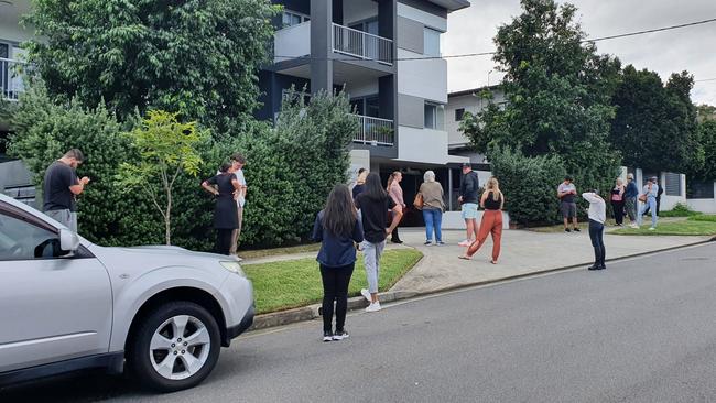 Renters line up to inspect a unit for rent in Kedron. Image: Debra Bela.