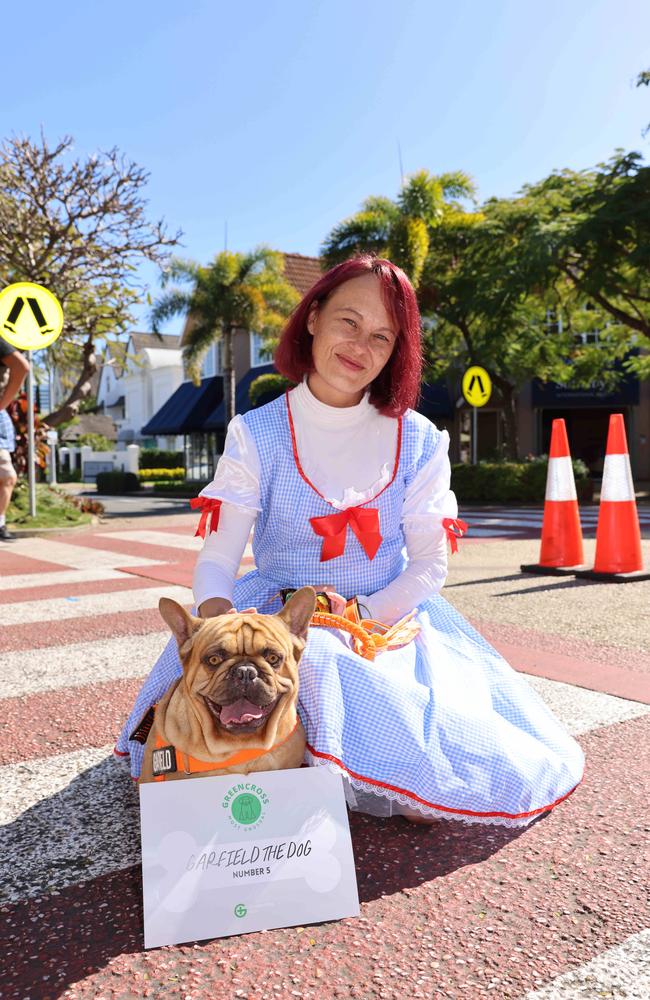 Nicole Lyons and Garfield the Dog at the Ray White Surfers Paradise Next Top Dogel competition on Tedder Avenue Main Beach. Picture, Portia Large.