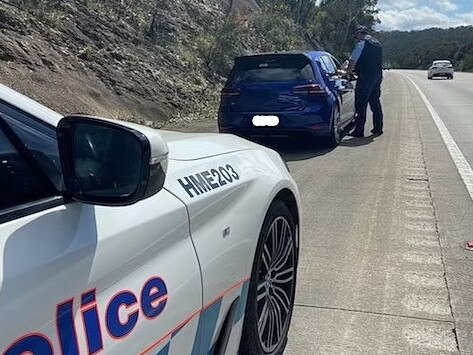 Police pulling over Rajabali Atoev after he was caught doing 280km in a Volkswagen on the Hume Hwy outside Mittagong. Picture: NSW Police