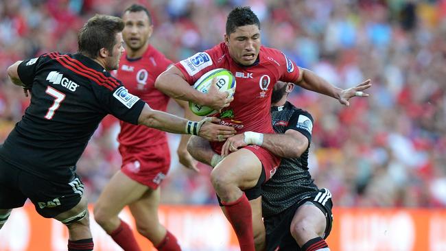 Anthony Faingaa attempts to break through the Crusaders’ defence.