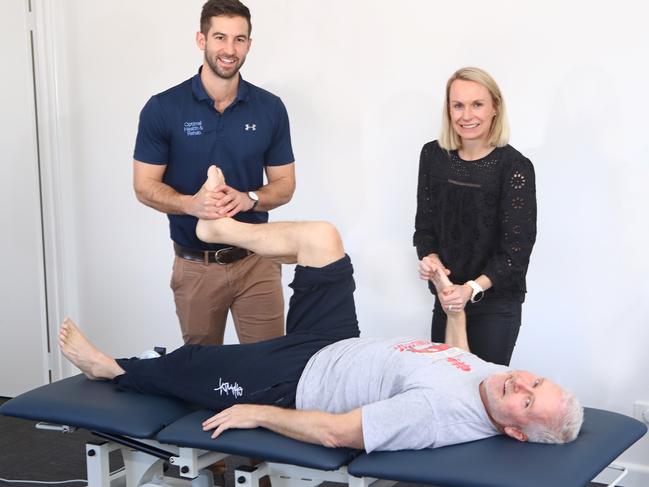 Adam Whiting and Sara Coulter from Geelong and Surrounds Occupational Therapy. Pictured with stroke victim and client Tony Harris.picture: Glenn Ferguson