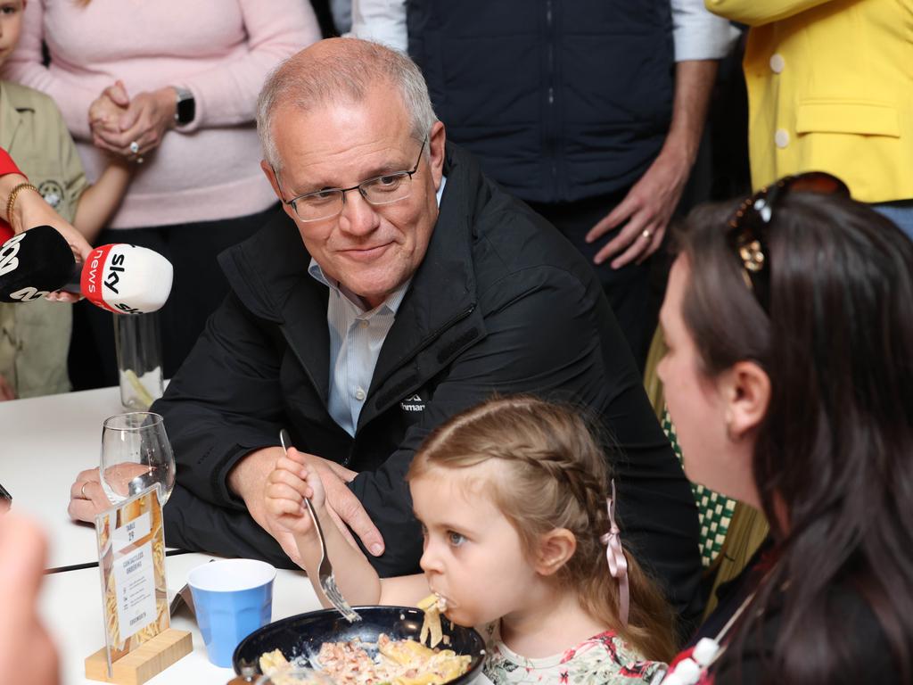 Even the Prime Minister could not get between a young girl and her pub meal, however. Picture: Damian Shaw