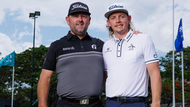 Cameron Smith with coach Grant Field at the Royal Queensland Golf Club. Picture Lachie Millard