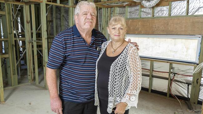 Don and Sharon Rankin at their unfinished home in Manly. Picture: Richard Walker