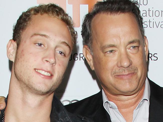 TORONTO, ON - SEPTEMBER 08: Tom Hanks (R) and his son Chet Hanks arrive at "Cloud Atlas" premiere during the 2012 Toronto International Film Festival held at Princess of Wales Theatre on September 8, 2012 in Toronto, Canada. (Photo by Michael Tran/FilmMagic)