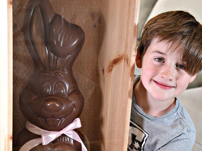 Kai Mason,9, is the lucky winner of a 4kg chocolate bunny from a colouring in competition.