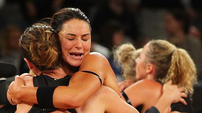 Sharni Layton of the Magpies celebrates victory with teammate Ashleigh Brazill.