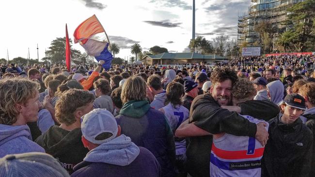 Mornington players and supporters celebrate their win. Picture: Valeriu Campan