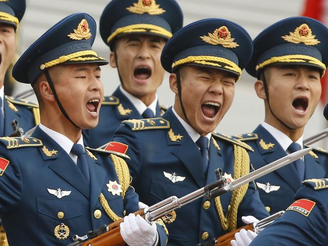 BEIJING, CHINA - NOVEMBER 9:  Military troops march during a welcoming ceremony for U.S. President Donald Trump on November 9, 2017 in Beijing, China. Trump is on a 10-day trip to Asia.  (Photo by Thomas Peter-Pool/Getty Images) ***BESTPIX***