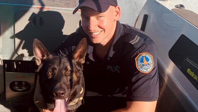 Senior COnstable Harry Vincent with Patrol Dog Quake who died this week after a short illness. Picture: NT Police