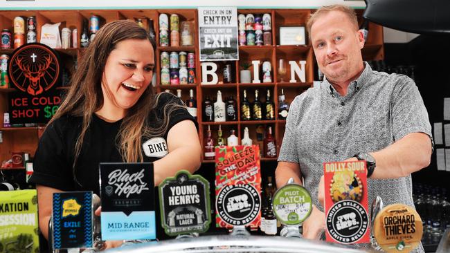 Bine Bar and Dining’s Scott Imlach behind the bar with worker Jenna Cook. Mr Imlach is on the hunt for about 15 new workers. Picture: Scott Powick