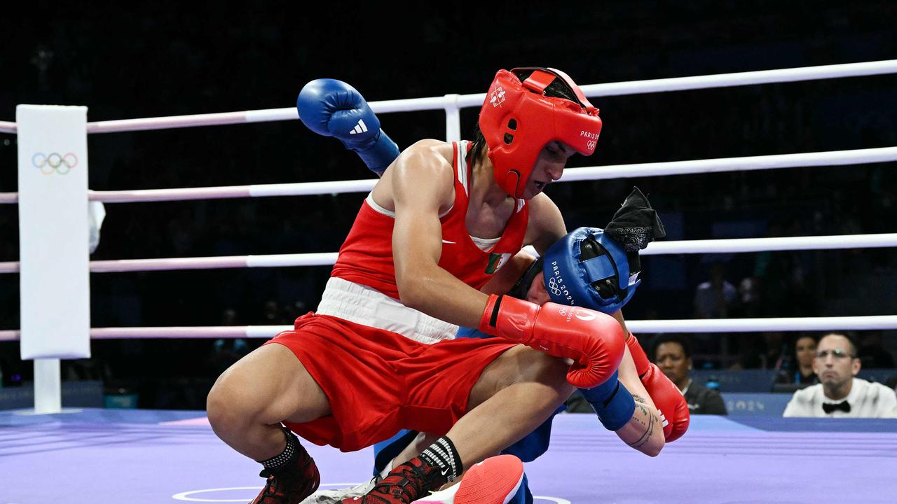 Algeria’s Imane Khelif was docked a point for holding after a move which saw both fighters hit the canvas. Picture: AFP