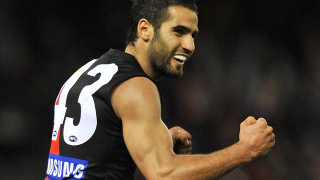 Movement ... Essendon's Bachar Houli wants to swap the red stripe for a yellow stripe.