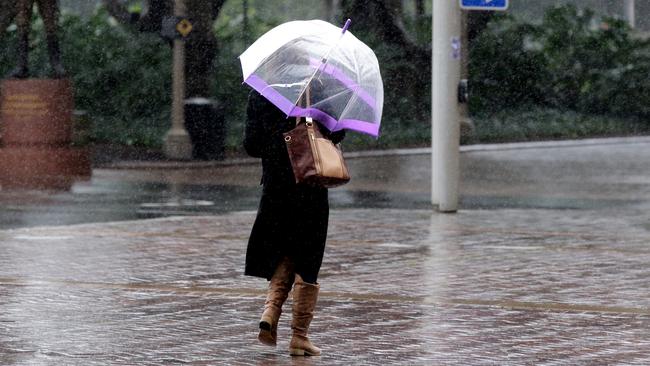 You’re going to need the umbrella handy for a few months yet. Picture: Ross Schultz