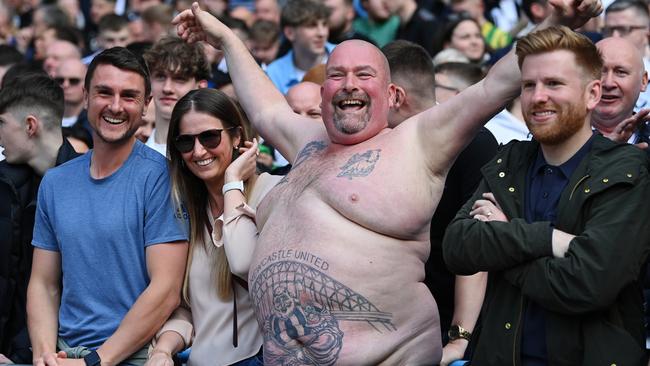 MANCHESTER, ENGLAND - MAY 08: Fans of Newcastle United pose for a photograph prior to kick off of the Premier League match between Manchester City and Newcastle United at Etihad Stadium on May 08, 2022 in Manchester, England. (Photo by Stu Forster/Getty Images)