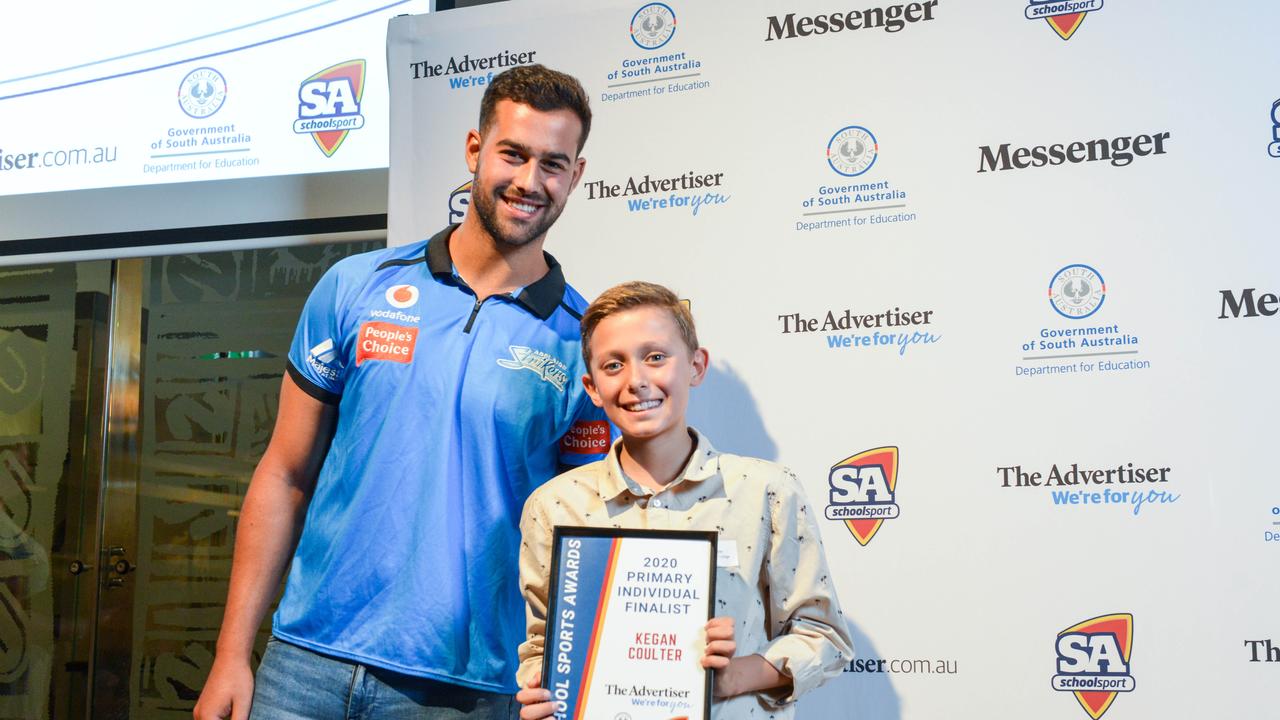 Cricketer Wes Agar with finalist Keagan Coulter from Faith Lutheran School at The School Sports Awards at the SA Museum. Picture: Brenton Edwards