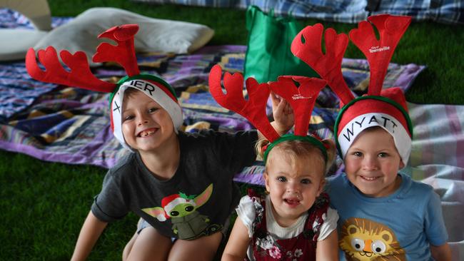 Carols by Candlelight at Riverway 2022. Xavier, 5, Claire, 1, and Wyatt House, 4. Picture: Evan Morgan