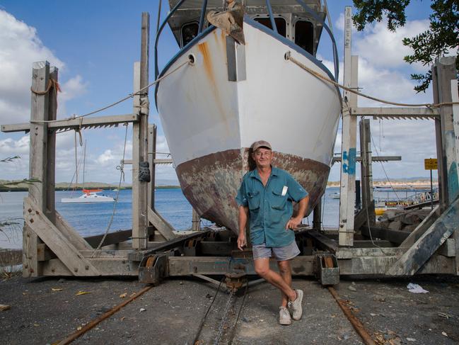 Mackerel fisherman, Fred Bennett, works on his boat on the banks of the Endeavour River, meters from the location that Cook beached the Endeavour for repairs. Picture: Marc McCormack