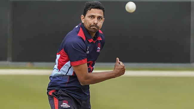 Suraj Randiv bowling for Dandenong. Picture: Valeriu Campan