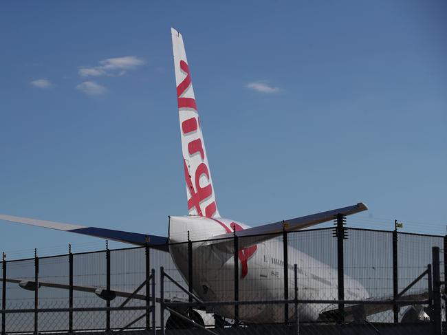 SYDNEY, AUSTRALIA - NewsWire Photos  July 1: Qantas is still flying domestic routes from Sydney Airport while Virgin planes seem to be parked for now. Picture: NCA NewsWire - David Swift