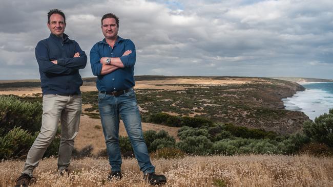 Designer Darius Oliver, left, and project chief Sam Atkins on the site where The Cliffs golf course will be built on the south coast of fire-ravaged Kangaroo Island. Picture: Sean McGowan