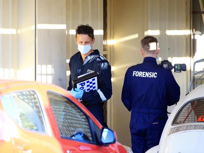 Forensic detectives probe the Tootgarook home. Picture: Mark Stewart