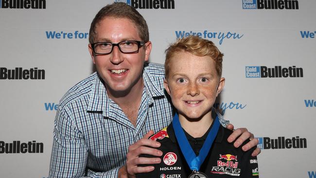 Gold coast Bulletin Sports Editor Rhys O'Neill presents Young Sporting Spirit individual award to Liam Barnes, 12. Picture Glenn Hampson