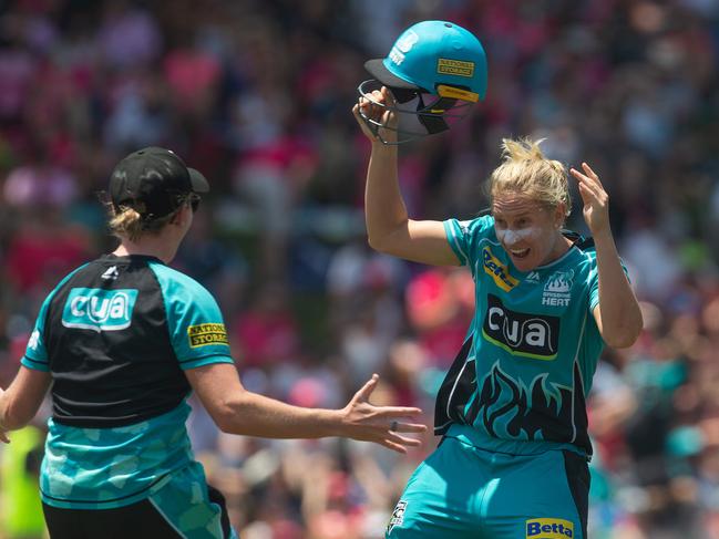 Brisbane Heat’s Delissa Kimmince celebrates their victory over the Sydney Sixers at Drummoyne Oval on Australia Day. Picture: AAP Image/Steve Christo