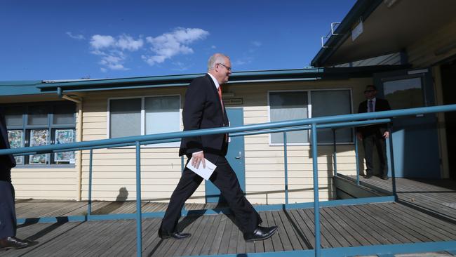 Scott Morrison strides into the public forum with senior members of the Corangamite community. The forum focused on issues that are significant to seniors and retirees, including Labor's retiree tax. Picture Gary Ramage