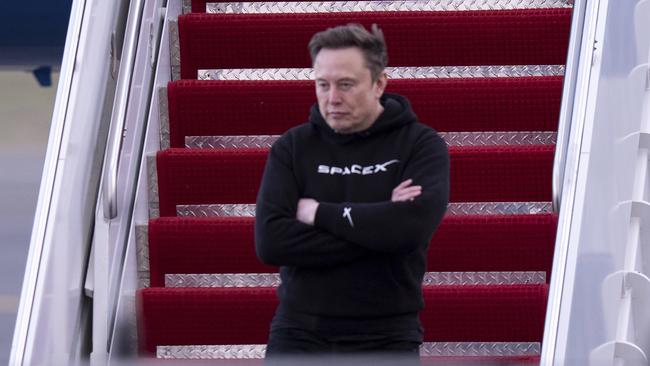 Elon Musk arrives on Air Force One. Picture: AP Photo/Chris Szagola