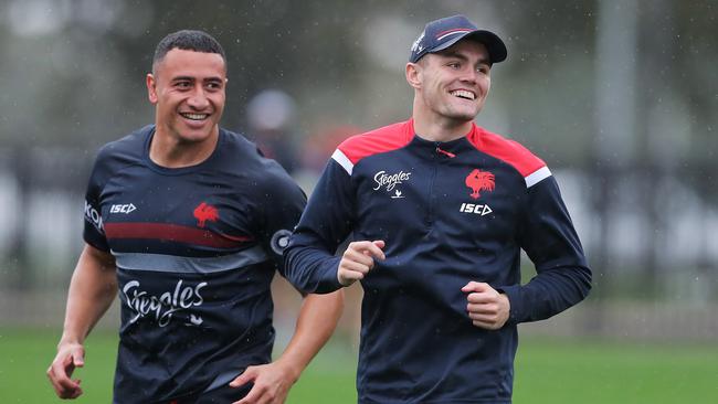 Siosiua Taukeiaho, left, and dropped Roosters halfback Kyle Flanagan