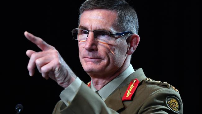 Chief of the Australian Defence Force (ADF) General Angus Campbell delivers the findings from the Inspector-General of the Australian Defence Force Afghanistan Inquiry on November 19, 2020 in Canberra, Australia. A landmark report has shed light on alleged war crimes by Australian troops serving in Afghanistan. (Photo by Mick Tsikas – Pool/Getty Images)