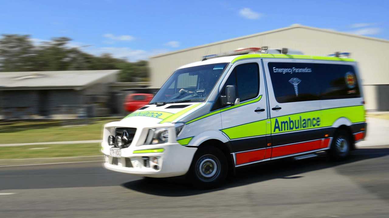 SOMERSET: Queensland Ambulance Service Paramedics transport three patients to hospital. Picture: David Nielsen