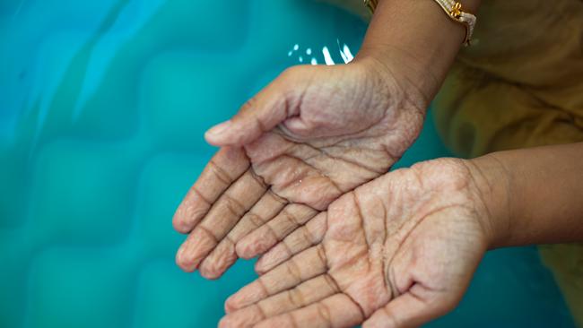 Wrinkly fingers after a swim are caused by constricting blood vessels. Picture: iStock