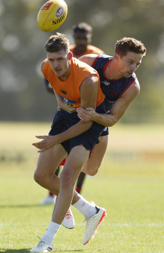 Blake Howes is tackled by Jack Billings at Melbourne training. Picture: Darrian Traynor/Getty Images