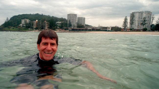 Billabong surf wear founder and Managing Director Gordon Merchant swimming at Burleigh Heads in 1997.