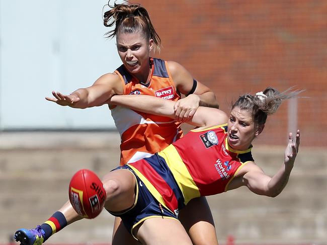 GWS’ Taylah Davies and Adelaide’s Deni Varnhagen fight for the ball. Picture: Sarah Reed