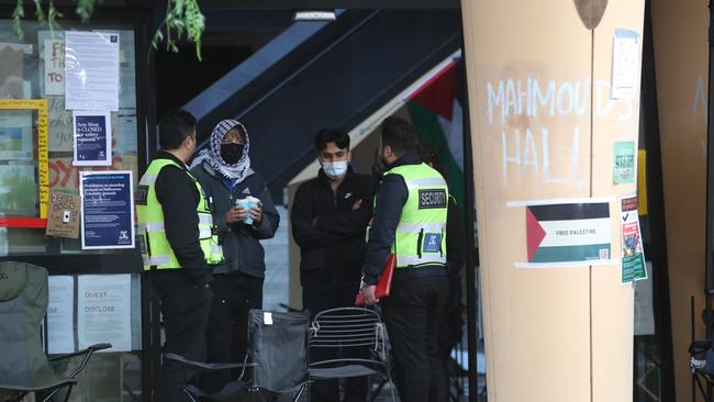 Protesters were still camped in the Arts West Building well into Thursday. Picture: David Crosling