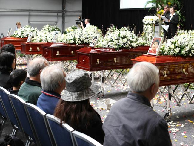 Five coffins lined up at the Lin family funeral at Olympic Park, Homebush in 2009. Picture: News Corp.