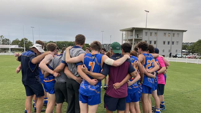 Charlie Cameron and the Ashgrove boys talking it out after a good win.