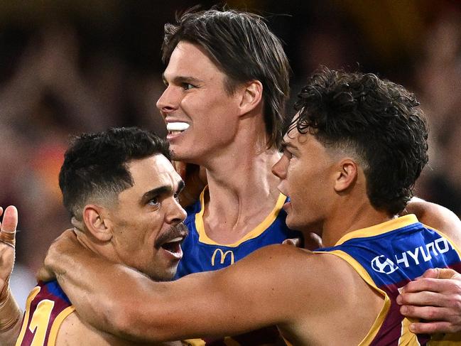 BRISBANE, AUSTRALIA – SEPTEMBER 23: Charlie Cameron, Eric Hipwood and Cam Rayner of the Lions celebrate a goal during the AFL Second Preliminary Final match between Brisbane Lions and Carlton Blues at The Gabba, on September 23, 2023, in Brisbane, Australia. (Photo by Quinn Rooney/Getty Images)