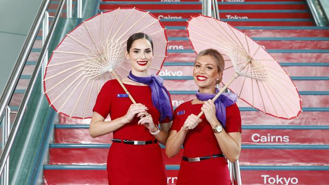 Virgin Australia staff members Jess Thomas and Mel Cressey at Cairns Airport promoting Cairns to Haneda Airport flights in 2023. Picture: Brendan Radke