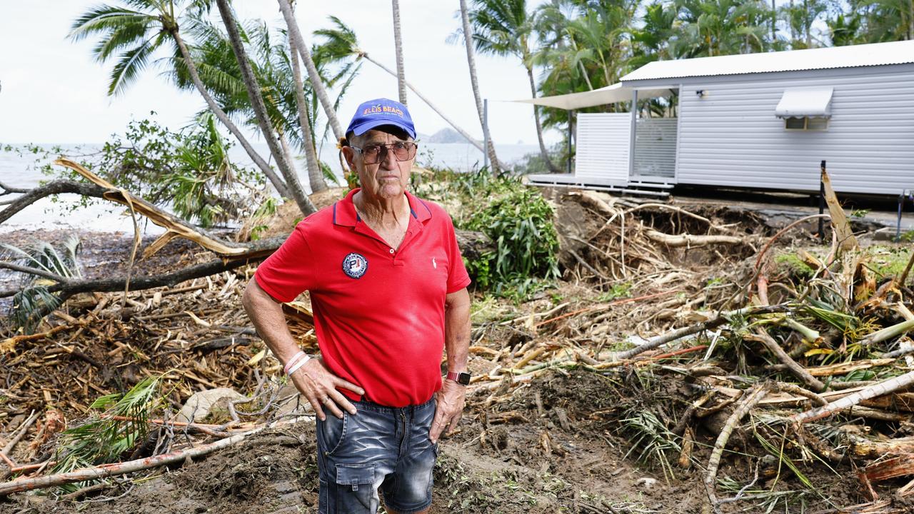 Tom Hedley stands in the Ellis Beach holiday park where huge landslides caused by flooding rain tore through the park on Sunday. Picture: Brendan Radke